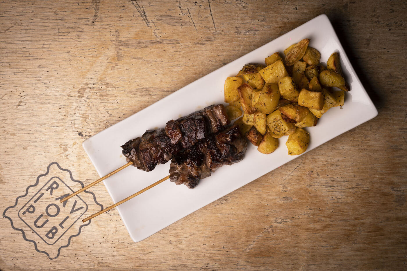 Spiedi di picanha con patate speziate
